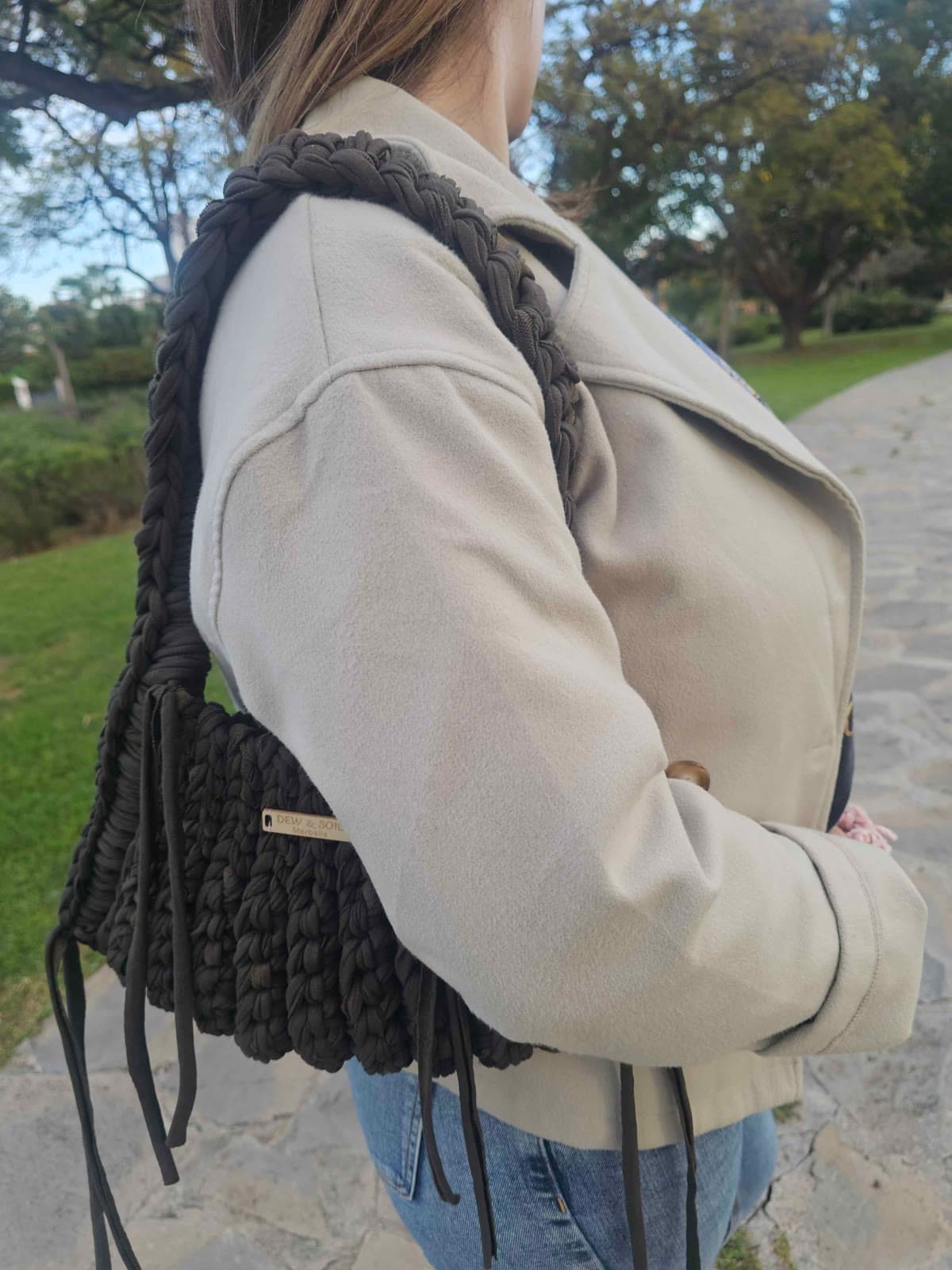 Braided Macrame Shoulder Bag — second angle showing braided strap and DEW&Soil plate
